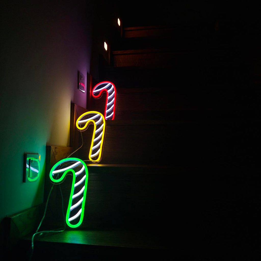 the staff led neon sign with color of red, green, and yellow