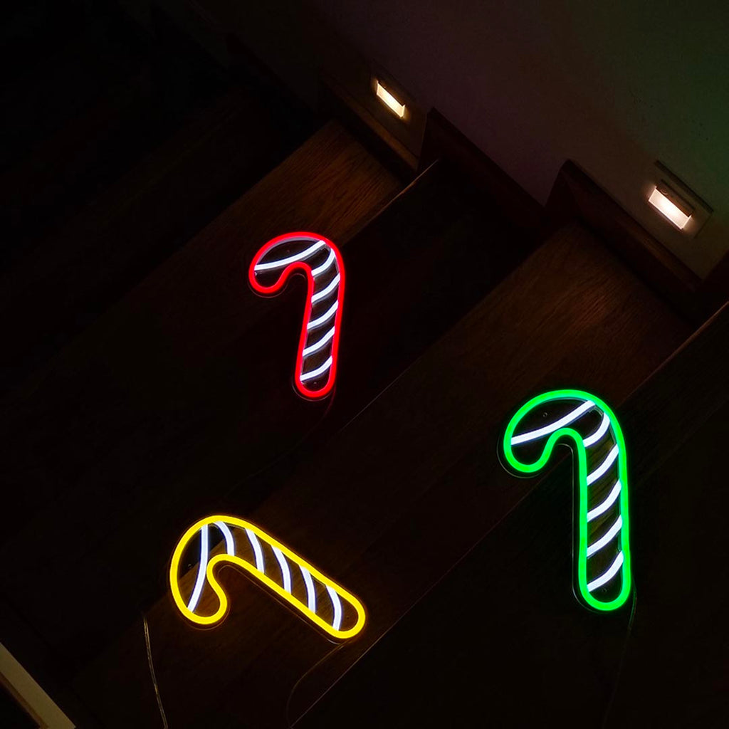 the staff led neon sign with color of red, green, and yellow